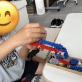 レゴで装置を組み立てる体験